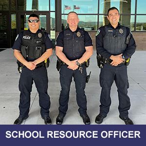 School Resources Officer in front of Hal Peterson Middle School