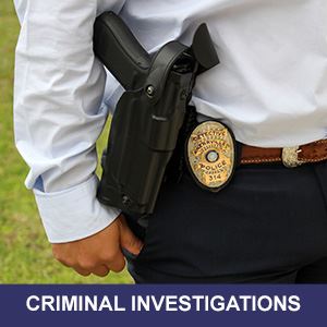 Officer at crime scene taking notes